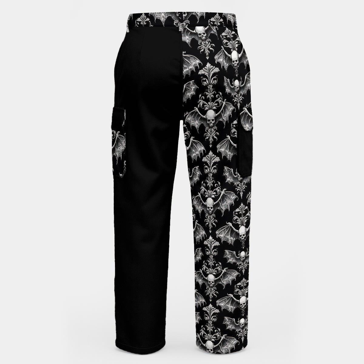 WREKED Winged Skull & Inky Void Printed Cargo Pants showcasing a split design with a bold skull print and black panel.