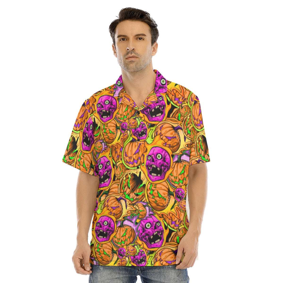Man wearing a colorful Halloween-themed shirt with pumpkins and ghosts on a white background
