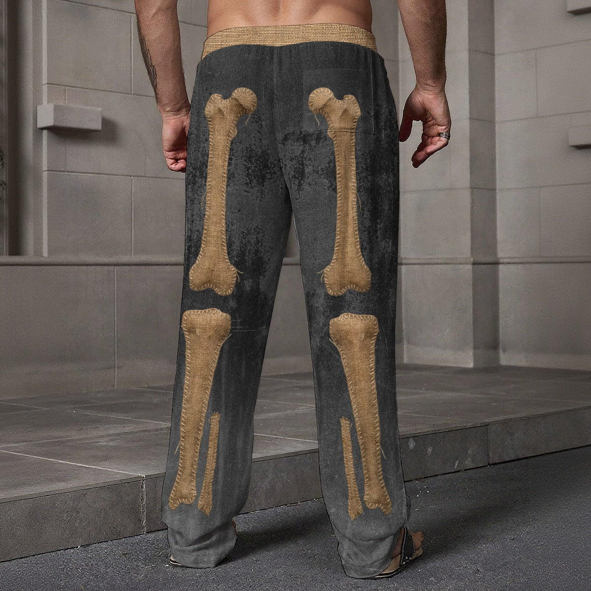 Burlap Skeleton Print Drawstring Pants (Relaxed Fit) showcasing bone design on the back.