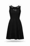 Black sleeveless dress with spider and bat embroidery.