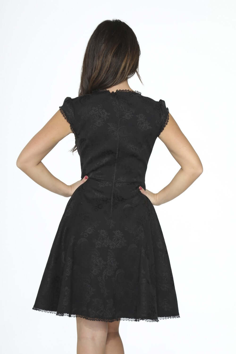 Back view of Black Brocade Swing Dress (with Pockets) showcasing fitted bodice and full swing skirt.