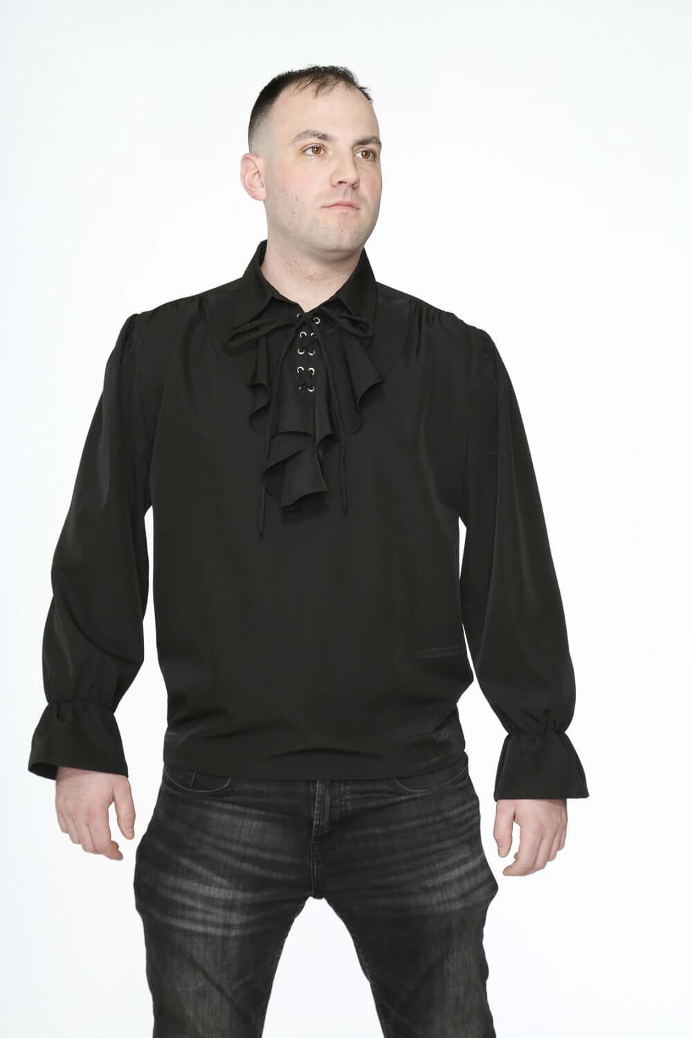 Man wearing a Black Pirate Poet Shirt featuring a lace-up front and ruffle detail, perfect for theatrical costumes.