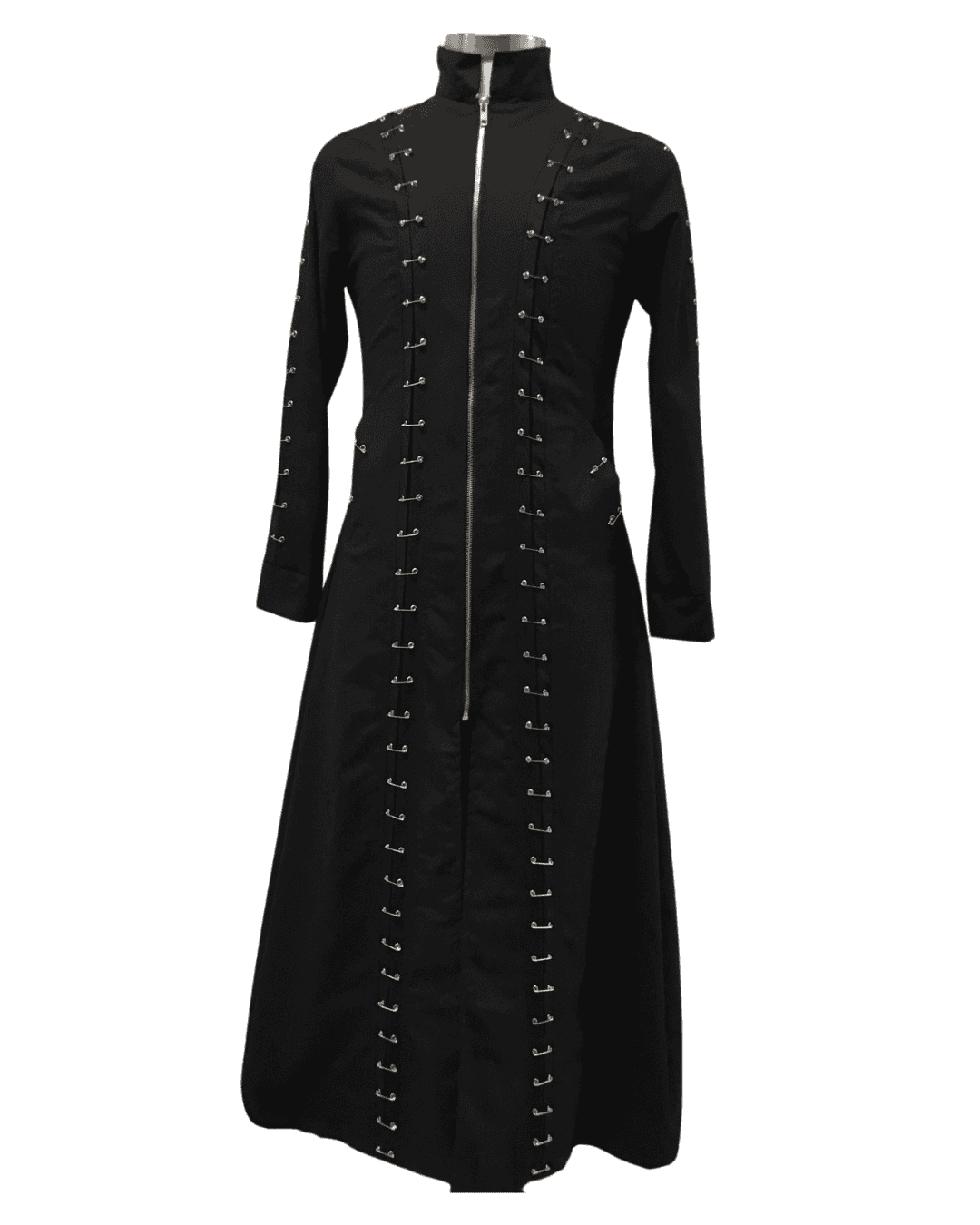 Long black safety-pin jacket.