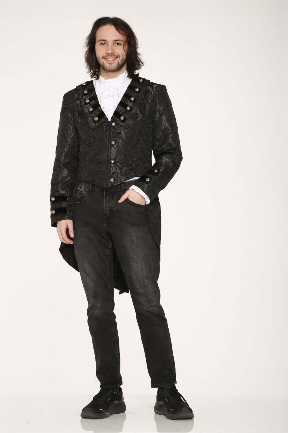 Men's Victorian-inspired black brocade tailcoat worn by a model, showcasing gothic style and elegance.