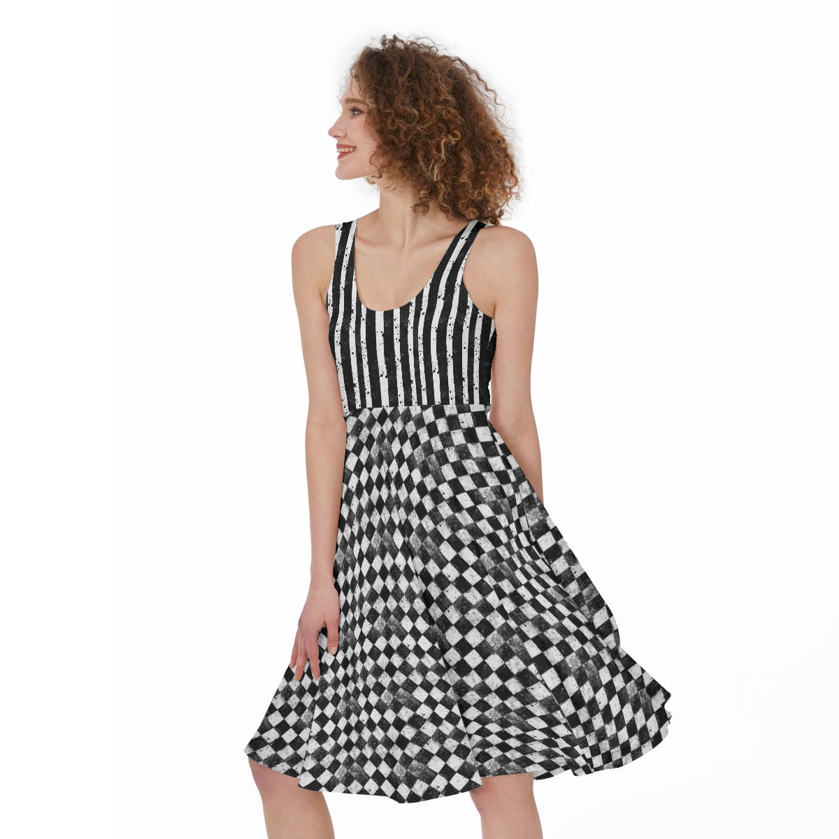 CARNYVL “Dirty Diamonds” Fit & Flare Dress in black and white with striped bodice and diamond skirt design.