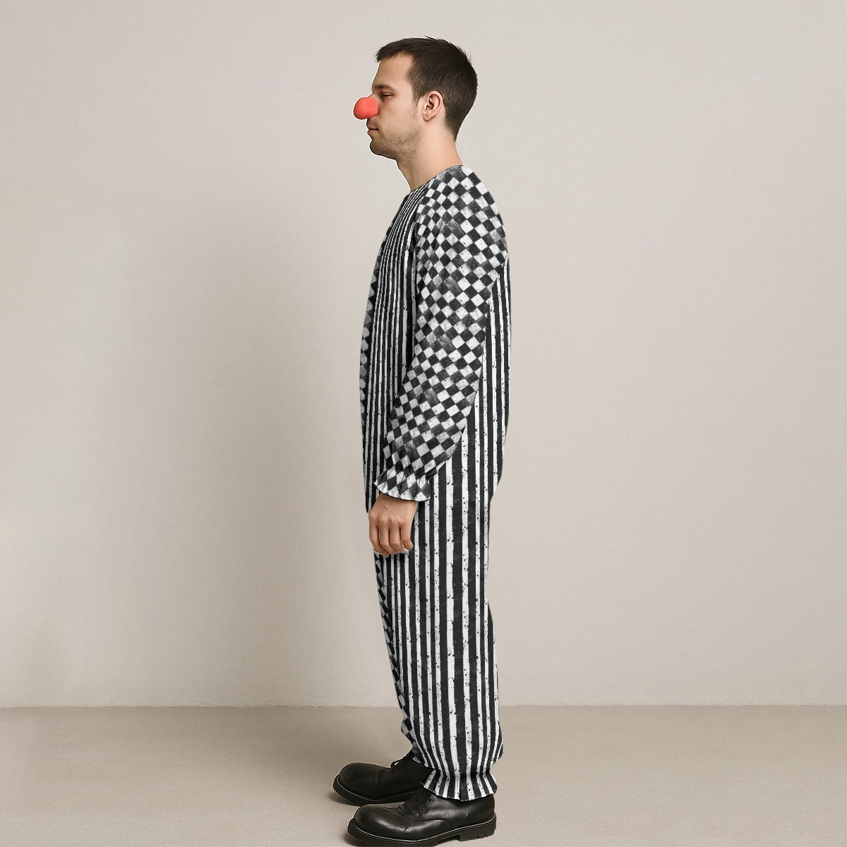 CARNYVL “Dirty Diamonds” Clown Jumpsuit in black and white stripes, shown on model with clown nose.