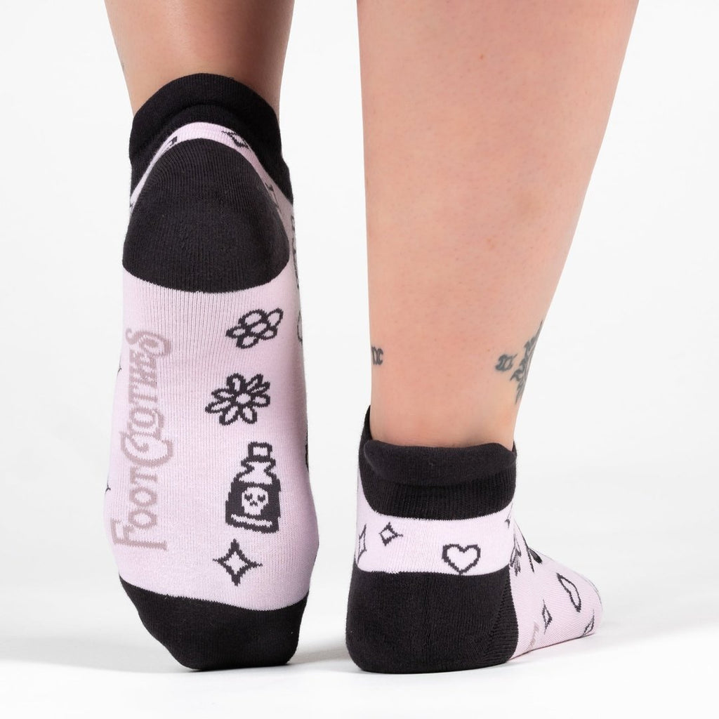 Pastel Goth Grim Reaper Ankle Socks featuring cute designs and black trim on the heel.