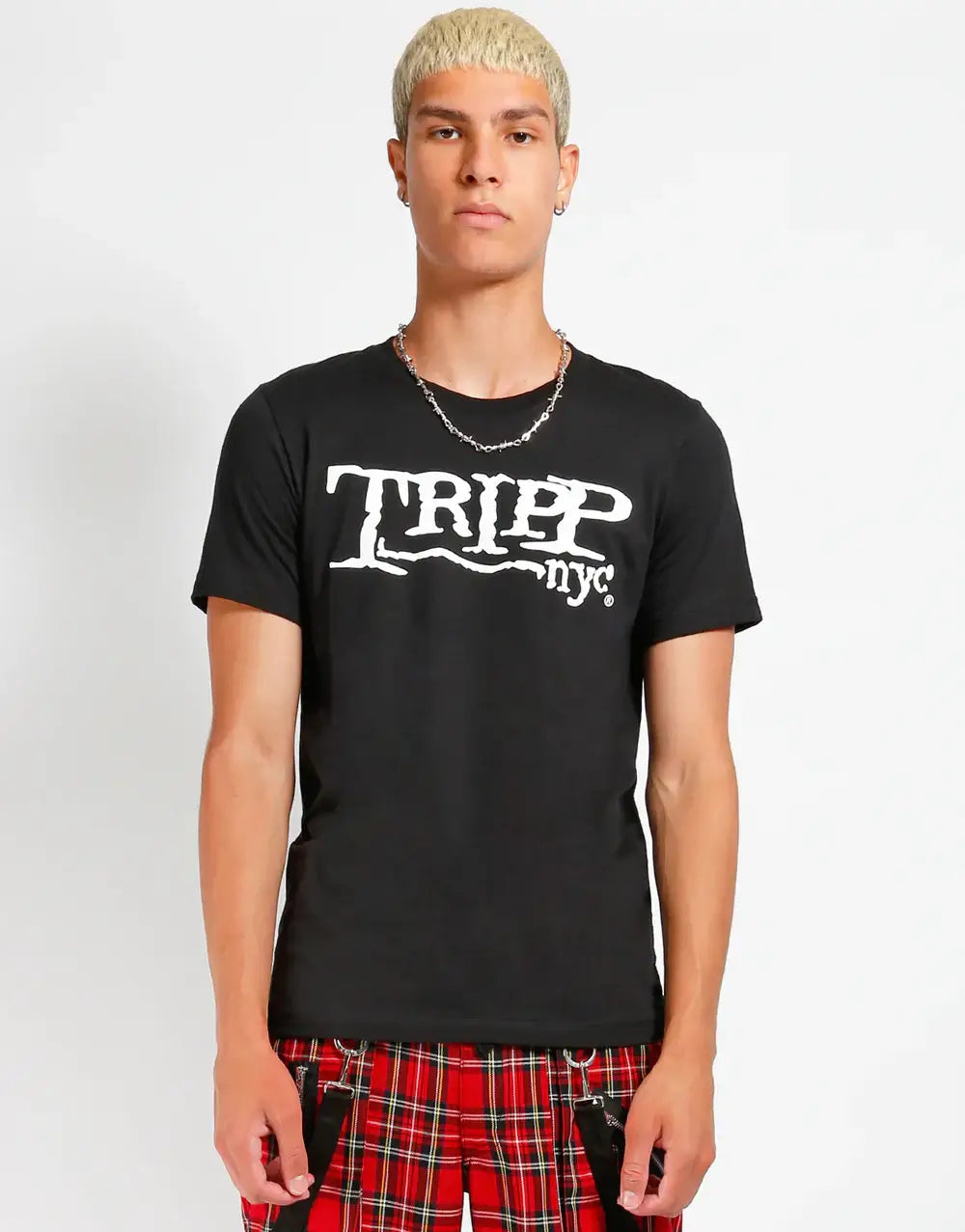 Tripp NYC T-Shirt – Gothic Punk Logo Graphic Tee worn by a model with trendy outfit.