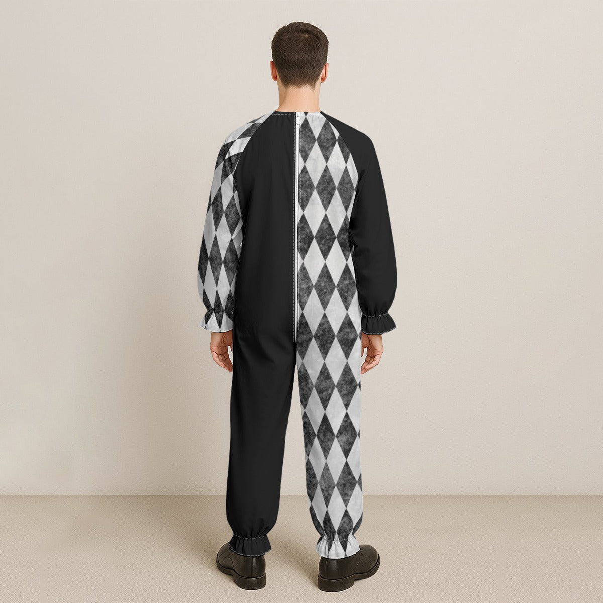Model wearing CARNYVL “Dirty Diamonds” Half & Half Clown Jumpsuit with black and white diamond pattern.
