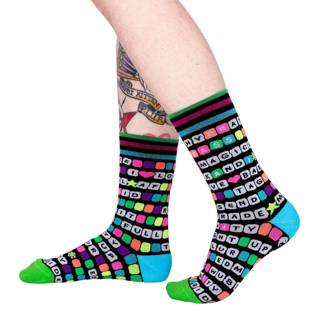Kandi Land UV-reactive crew socks.