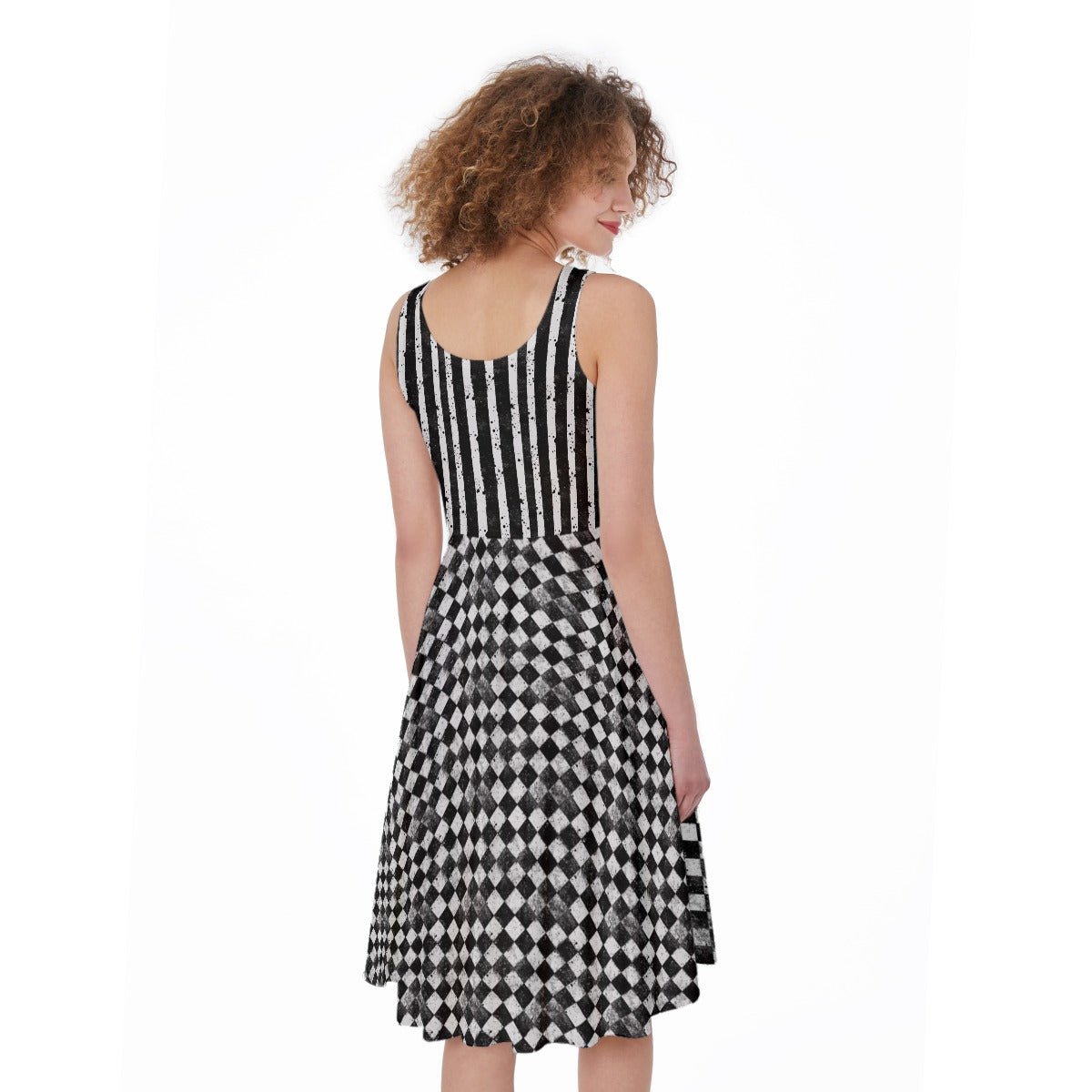 Back view of CARNYVL “Dirty Diamonds” Fit & Flare Dress showcasing its striped bodice and diamond-patterned skirt.