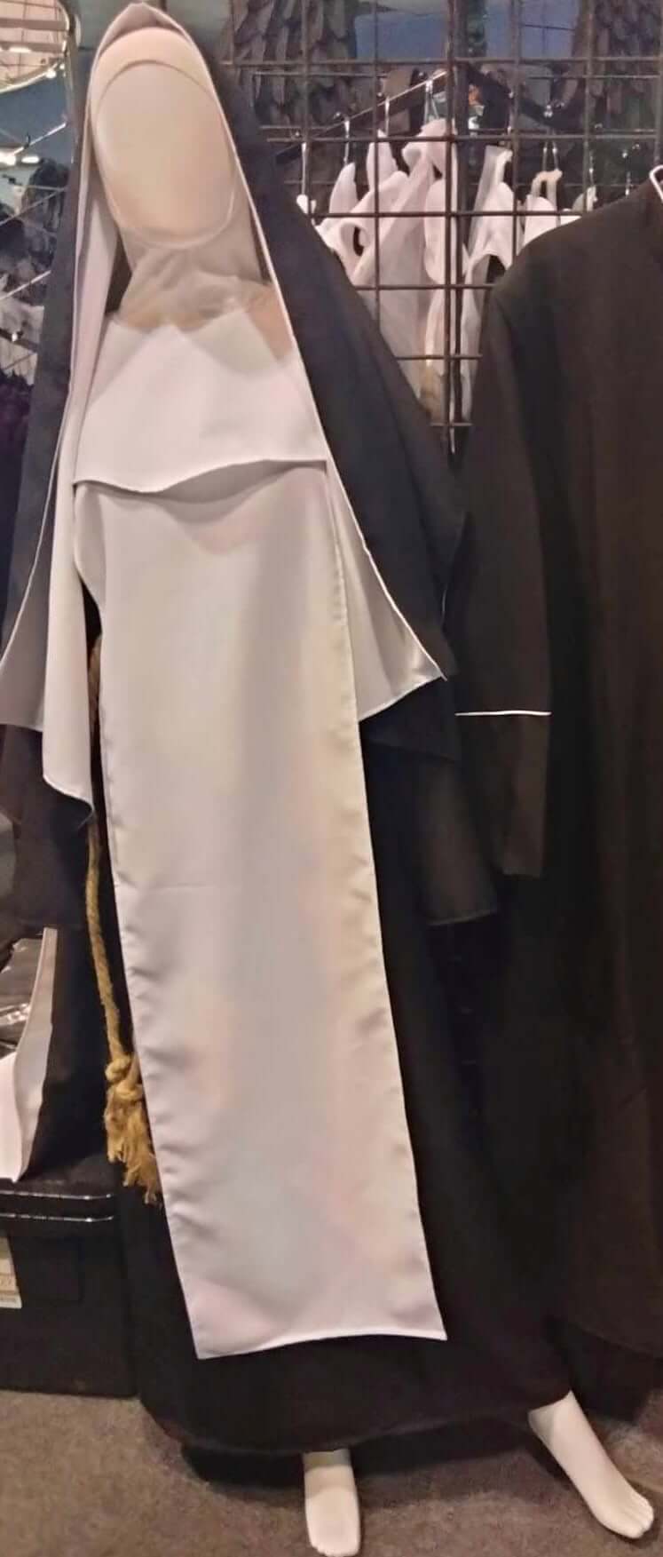 Nun Costume – Gothic “Sister Slaughter” 5-Piece Horror Outfit displayed on mannequin for Halloween.