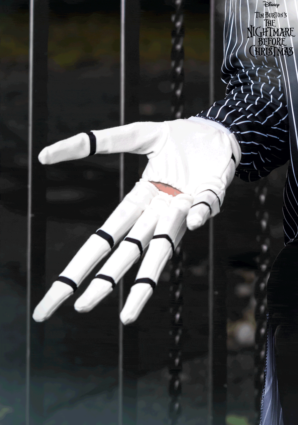 Skellington Gloves featured in a hand pose, inspired by Jack Skellington from The Nightmare Before Christmas.