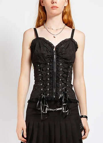 Tripp NYC Skull Corset Top – Gothic Punk Skull Embroidery Shirt worn by model showcasing its edgy design and tight fit.