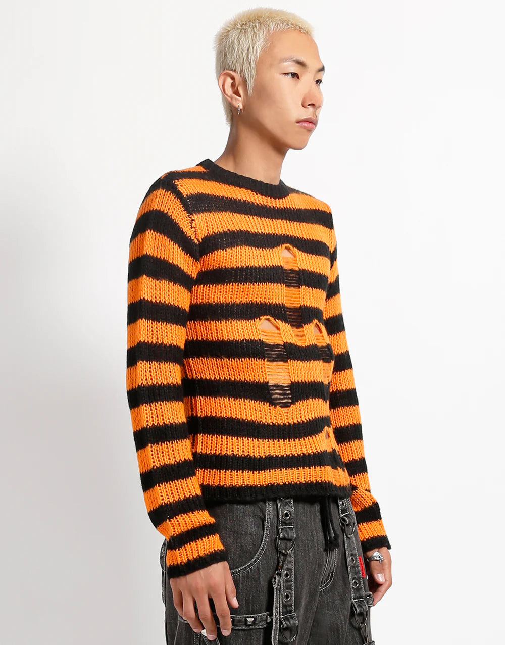 Tripp NYC Striped Sweater –  Unisex Punk Gothic Knit Sweater model wearing orange and black striped sweater.