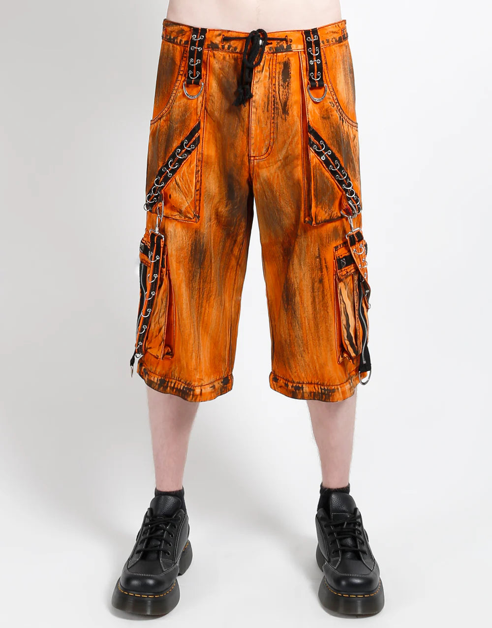 TRIPP NYC MIGHTY METAL PANT ORANGE INK WASH GOTHIC STREETWEAR worn by model, featuring bold ink wash finish.