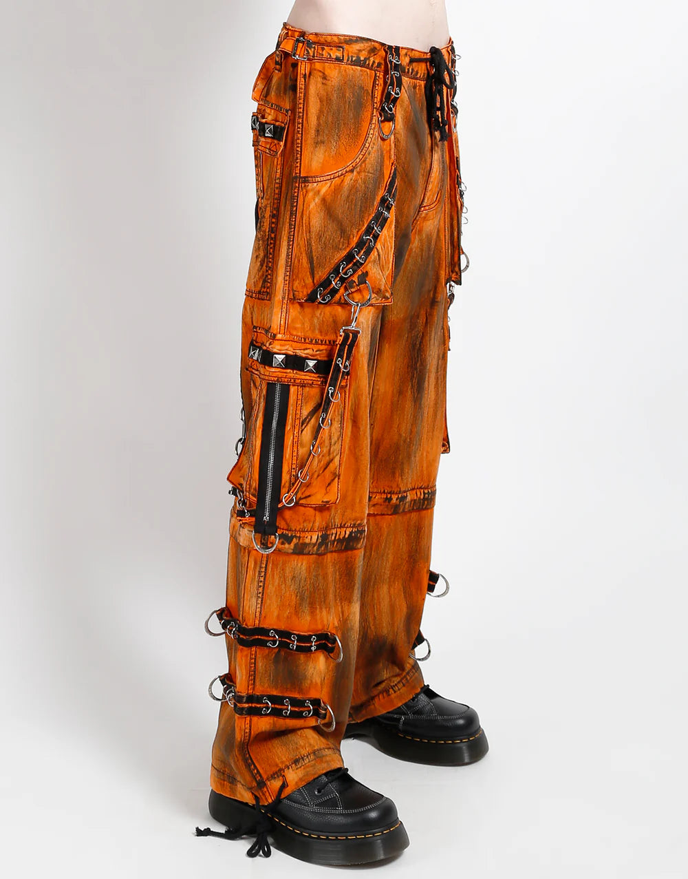 TRIPP NYC MIGHTY METAL PANT ORANGE INK WASH GOTHIC STREETWEAR showcasing bold ink wash finish and utility details.