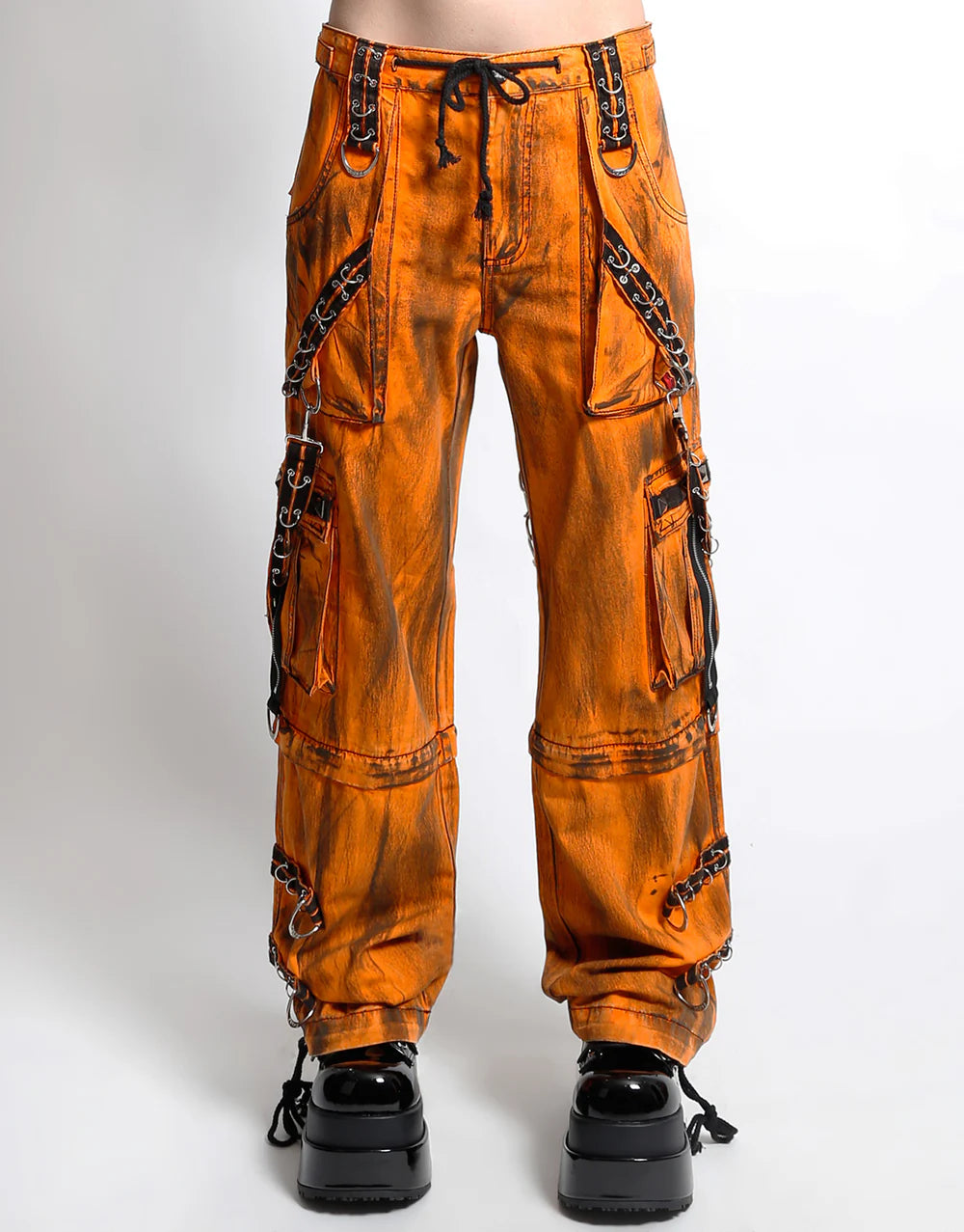 TRIPP NYC MIGHTY METAL PANT ORANGE INK WASH GOTHIC STREETWEAR showcasing bold ink wash finish and utility details.