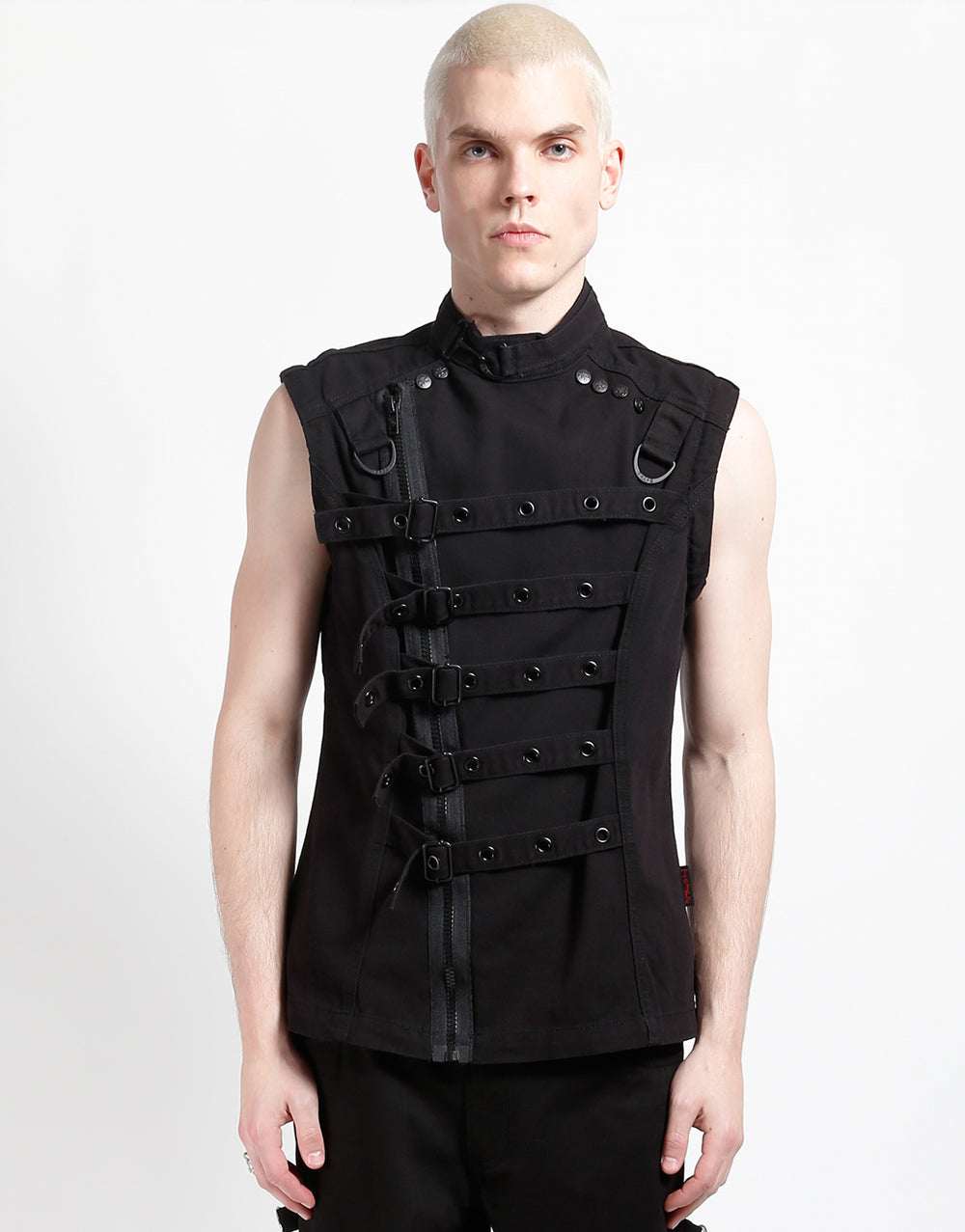 Model wearing the TRIPP zip off buckle jacket, showcasing its unique front design and adjustable buckles.