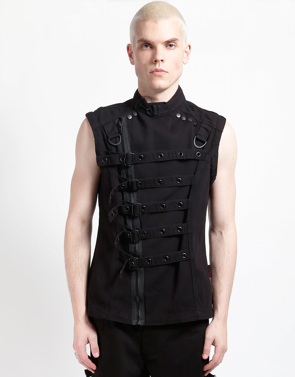 Model wearing the TRIPP zip off buckle jacket, showcasing its unique front design and adjustable buckles.