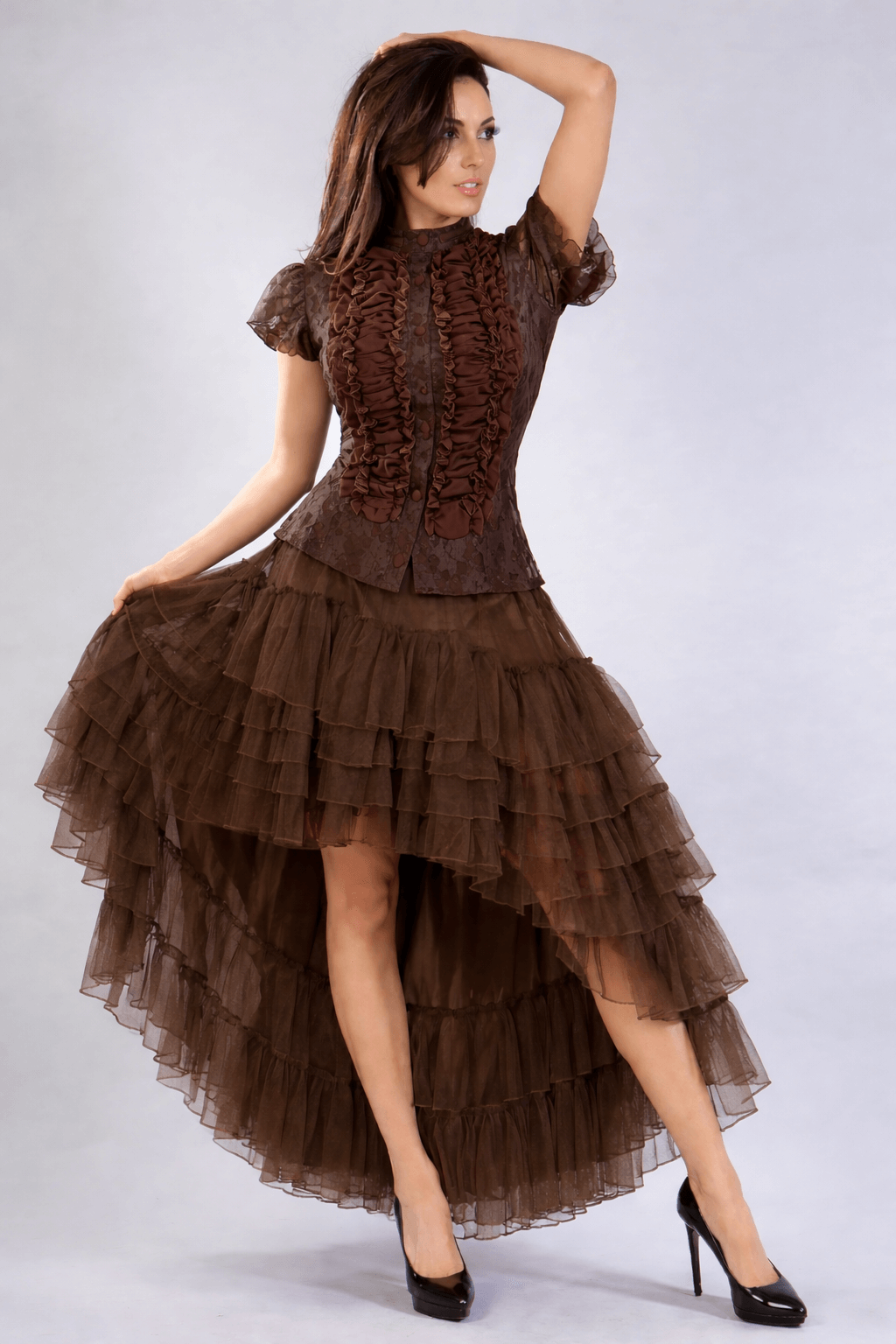 Amelia Long Burlesque Skirt – Brown Mesh modeled by a woman, showcasing a high-low silhouette and layered sheer tiers.