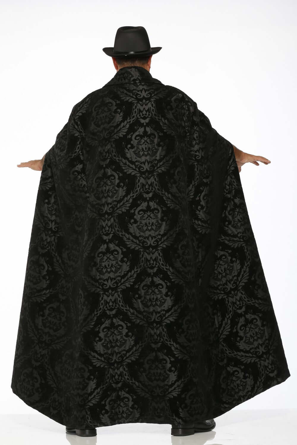 Black Brocade Men's cape - Dramatic Opera Cape worn by man from the back with theatrical elegance.