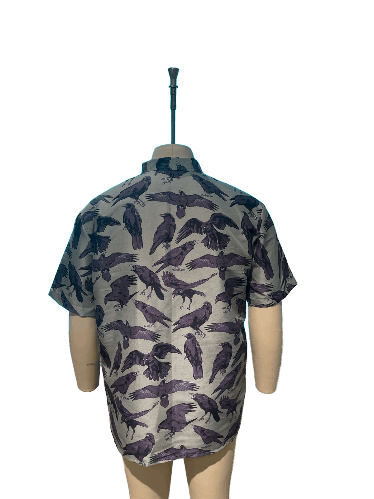 The Flock Gothic Button-Up Shirt showcasing a raven print design from the back on a mannequin.