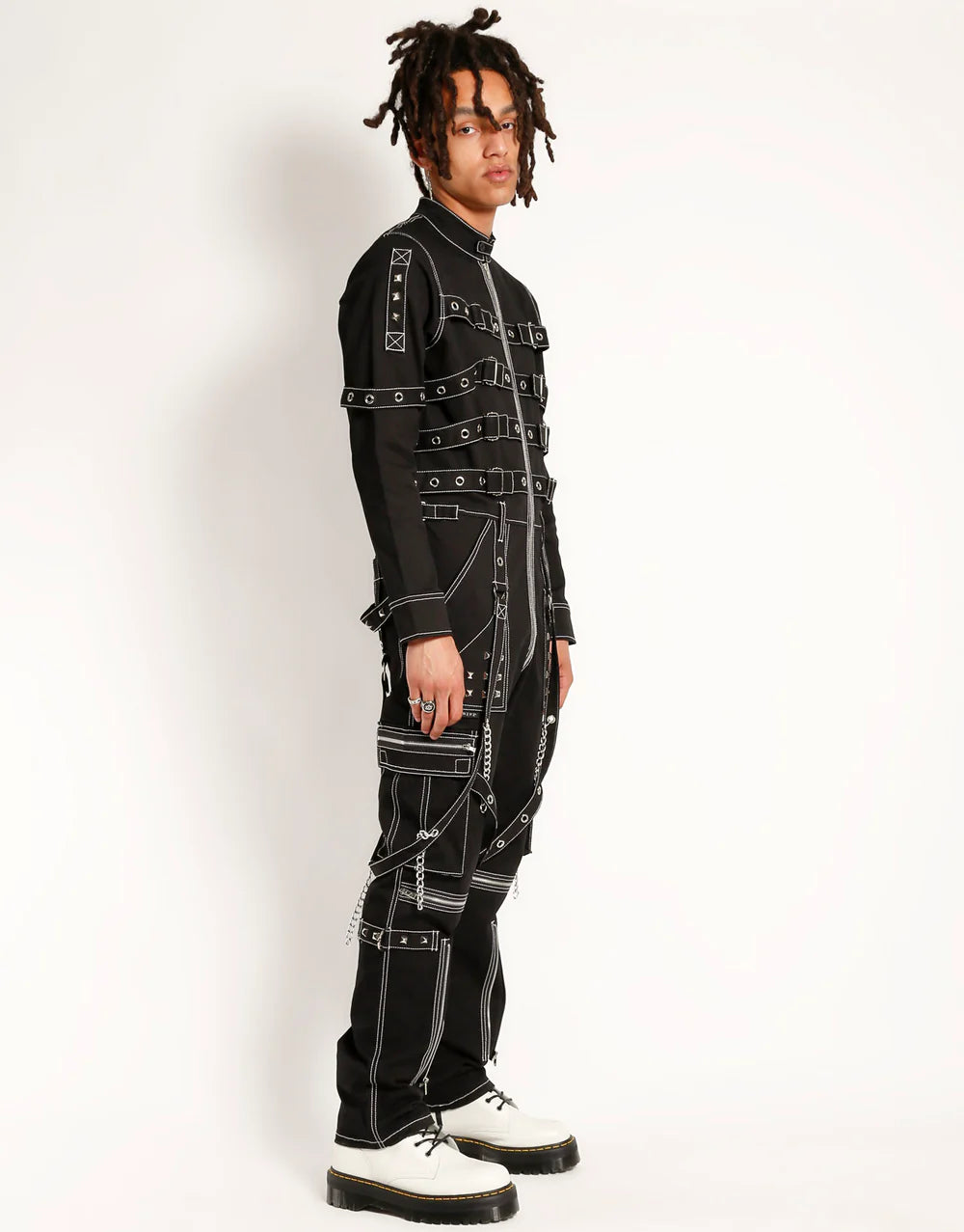 Model wearing TrippNYC Control Jumpsuit – Unisex Gothic Punk Streetwear showcasing edgy style and design.