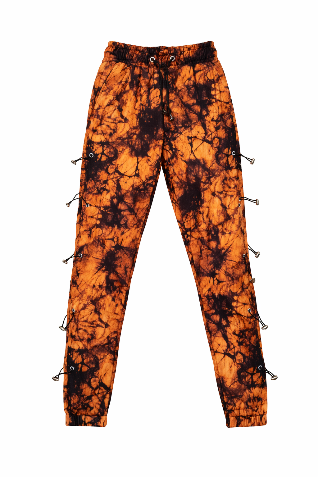 Tie-dye hoodie and sweatpant set featuring orange and black tie-dye sweatpants with decorative toggle hardware.