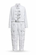 White Asylum jumpsuit with grommeted straps.