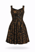 Black and gold brocade dress with corset lacing.