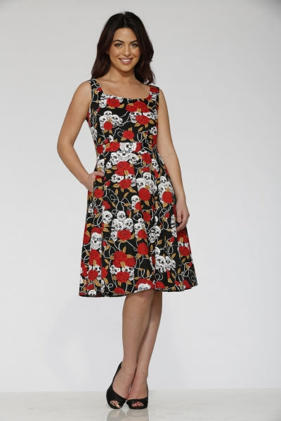 Gothic Dress – Skulls & Roses Fit-and-Flare Outfit featuring vivid red roses and white skulls on a black background.